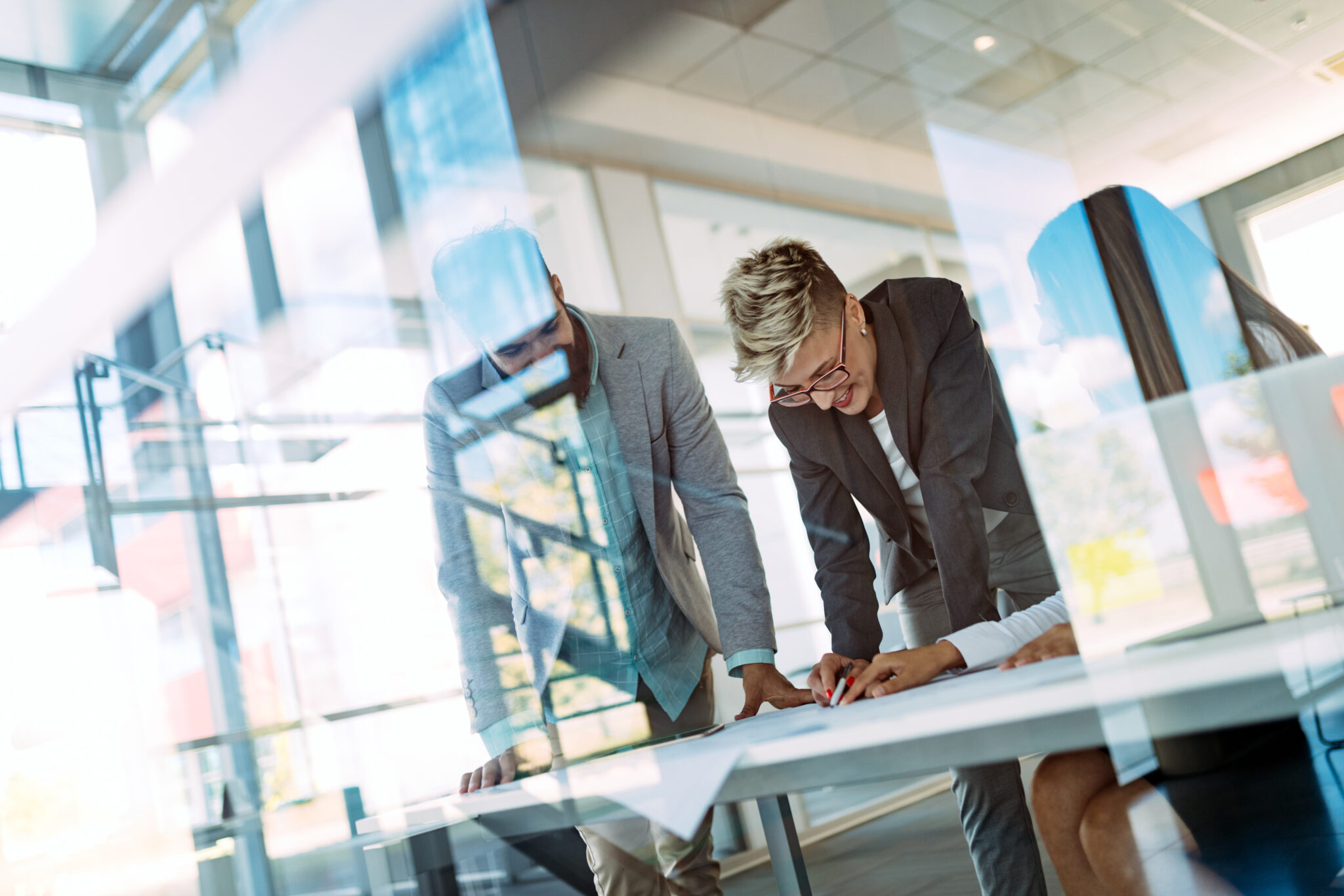 Collaboration and analysis by business people working in office